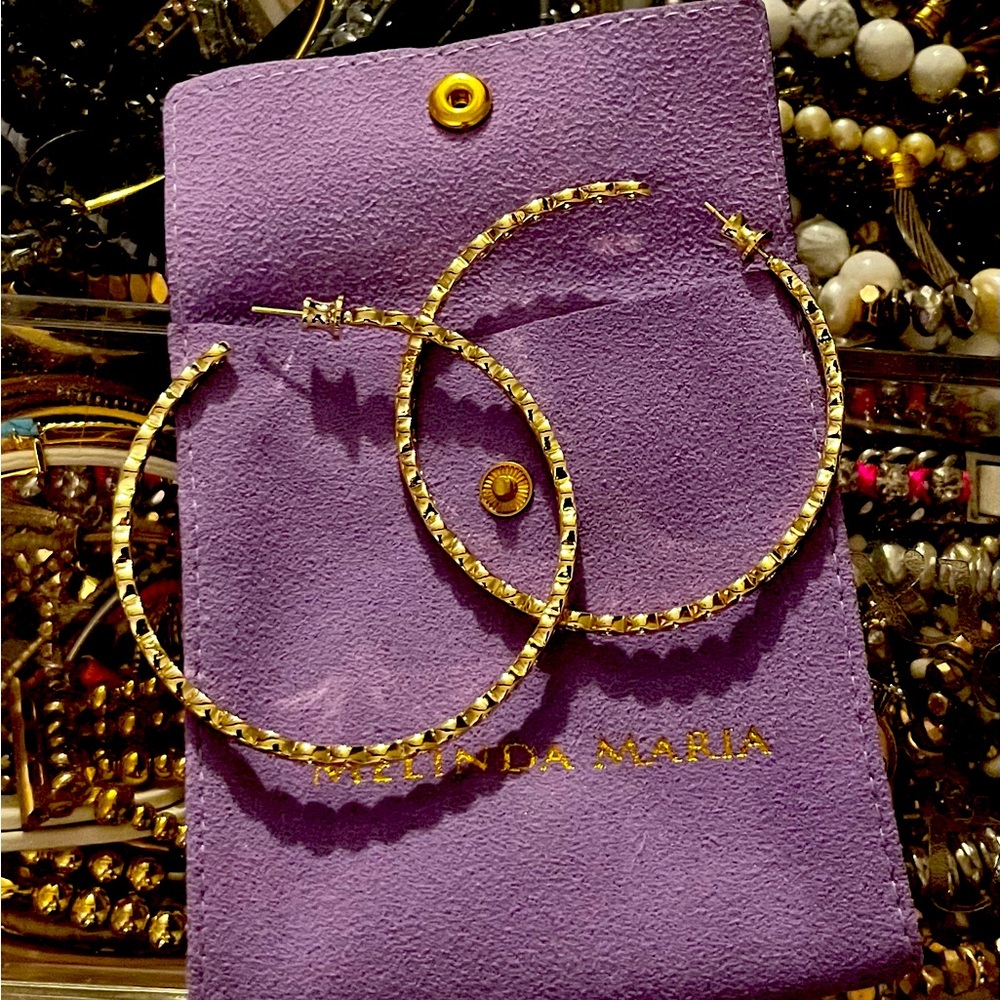 New in pkg. with velvet pouch Melinda Maria 2 1/2” Gold hoops with diamondetts